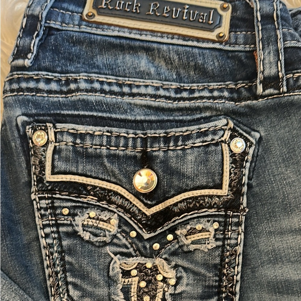 Rock Revival Blue Boot Cut Jeans with Embellished Pockets